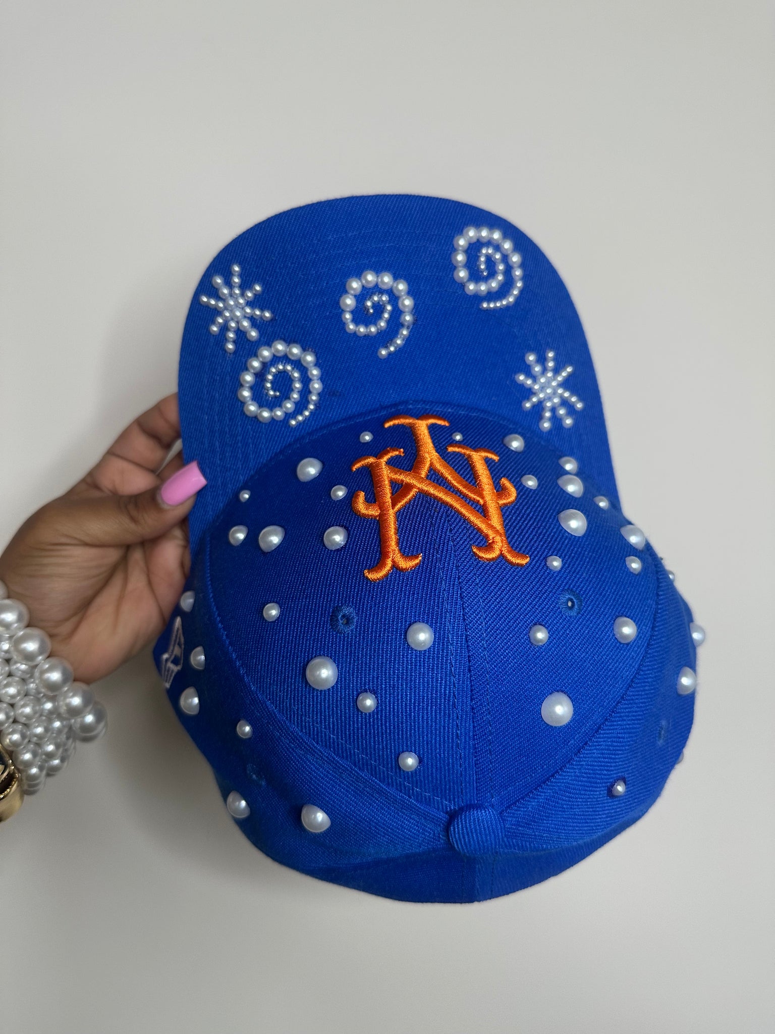 Pearls and swirls snapback hat